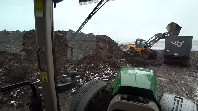 И снова возим навоз с буртов в поле.
