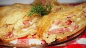 Рулетики из слоеного теста с колбасой и сыром рецепт приготування в описах