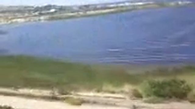 Qatarla Volqa çayının üzərindən keçərkən смотреть онлайн