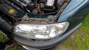 Снятие фары на Opel Omega B. Регулировка фары корректором и подстроечными винтами.