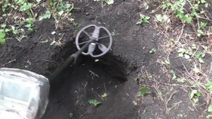 Тест на глубину залегания монет в грунте  Minelab Safari