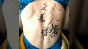 Body art photo shoot. Drawing on the back of a girl. Бодиарт на спине у девушки, жар-птица