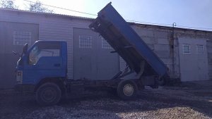 Гидравлический подъемник (кузнечик) для самосвала.