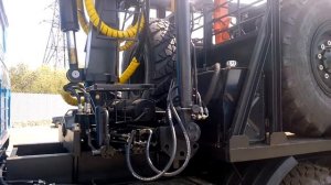 Урал лесовоз с гидроманипулятором   и прицепом роспуском