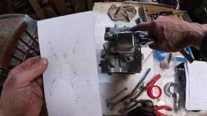 Сборка лодочного мотора Suzuki DF2,5 Видео 8 - Схема затяжки болтов головки цилиндра.