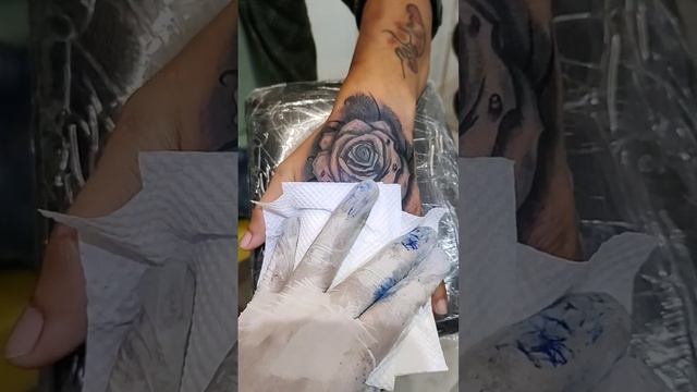 hand tattoo for men - rose design