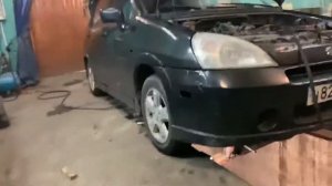 Замена натяжителя ремня навесного оборудования на Suzuki aerio s 2.0.