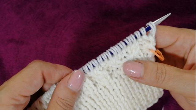 Шапка косами из мериноса