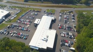 Battlefield Ford Culpeper Car dealership aerial drone video  orbit 360 4K