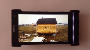 Обшивка фасада сайдингом. Камера наблюдения на объекте