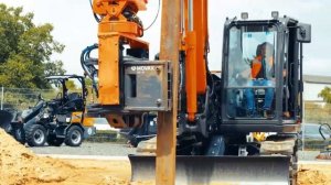 Вибропогружатель MOVAX SG 15N с боковым захватом погружает двутавровые балки