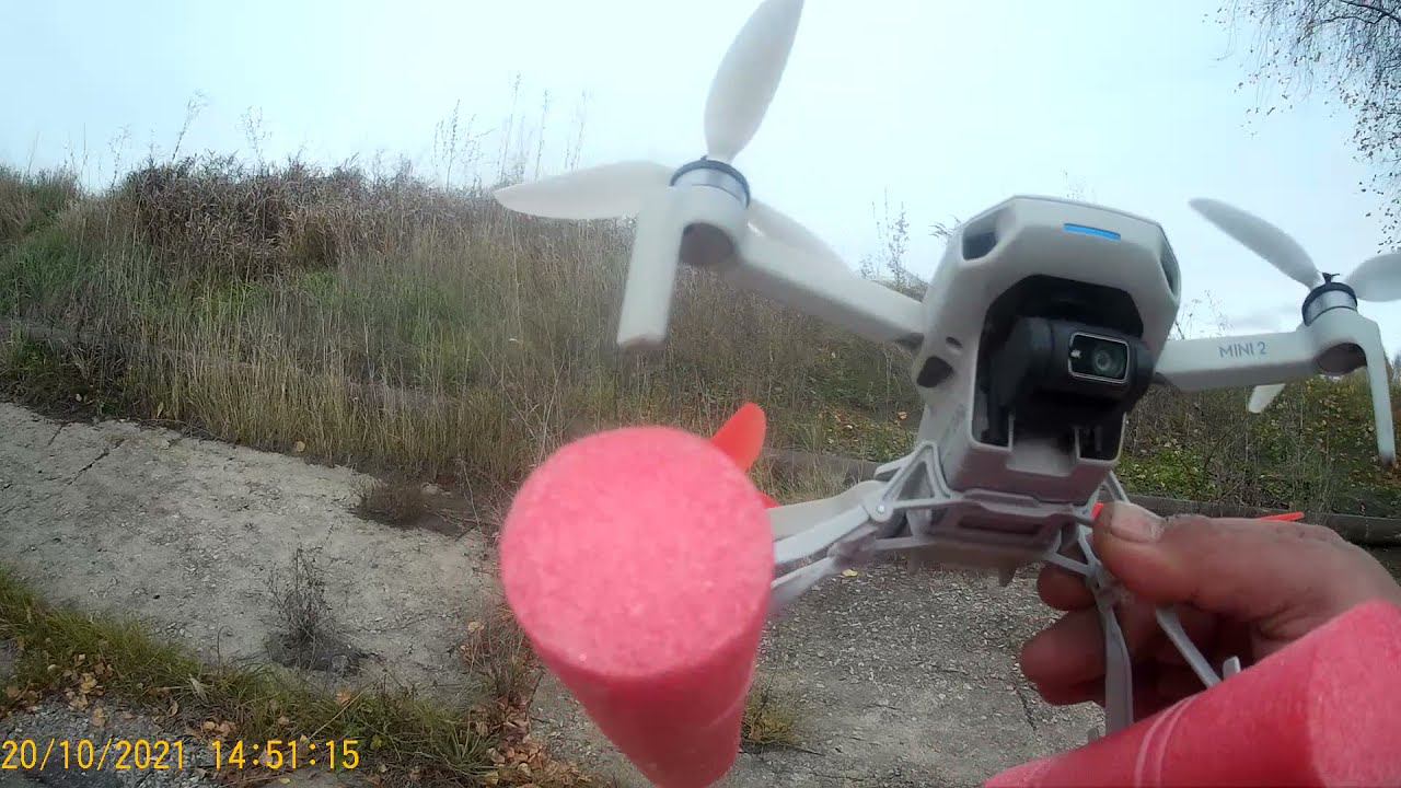 DJI MINI 2 с шасси для посадки на воду ..  DJI MINI 2 with landing gear for water landing ..
