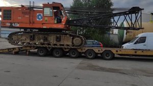 Гусеничный кран Hitachi KH300-3, сгоняем с трала 3метра шириной