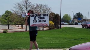 An Intactivist Demonstration at the Corner of Division and South Airport