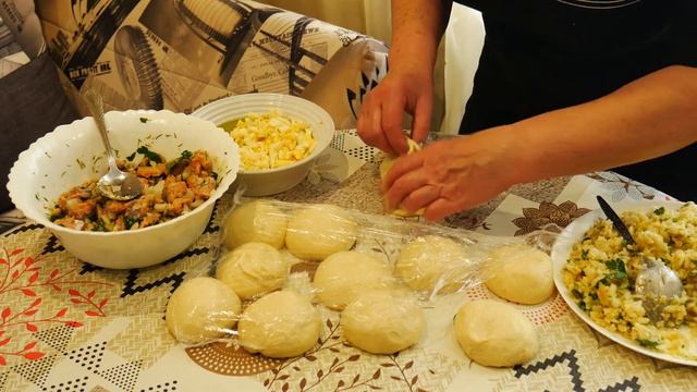 Пирожки расстегаи с рыбой,рисом и яйцом.