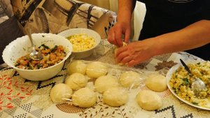 Пирожки расстегаи с рыбой,рисом и яйцом.