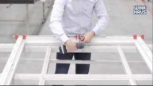 Установка фурнитуры на раме двустворчатого штульпового окна с помощью шаблонов