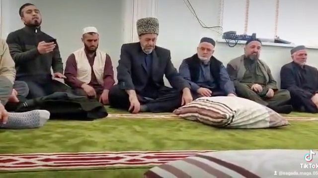 назму