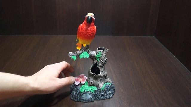 00226 inmagig.ru Игрушка Попугай на ветке . смотреть онлайн