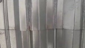 прокручиваем ангар из профлиста мало саморезов крутили предыдущие кровельщики