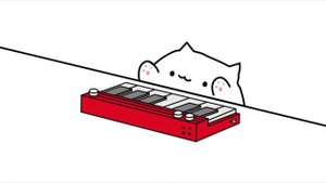 котик играет на пианино