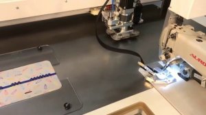 Швейный автомат для  притачивания молнии AS-0302-M. Разработано и произведено в России.