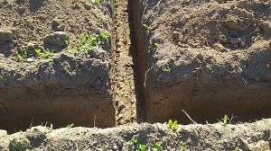 Траншея под фундамент дома