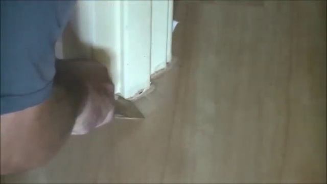 how to fit laminate flooring, Filling expansion space around door frames