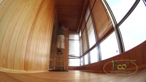 Балкон из лиственницы с декоративной антисептической обработкой