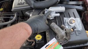 2003 JEEP GRAND CHEROKEE WJ 4.0 WATER PUMP, HOSE & THERMOSTAT REPLACEMENT.