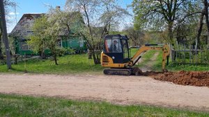 Мини экскаватор CATERPILLAR.Прокладка кабеля.