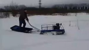 Мото буксировщик по глубокому снегу