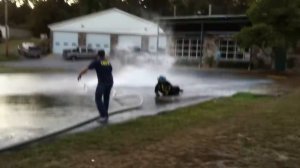 Kid gets owned by fire hose