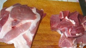 Тушеная капуста со свининой в казане