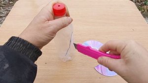 Ветряк из dvd диска и  пластиковой бутылки своими руками. Как избавиться от кротов и птиц