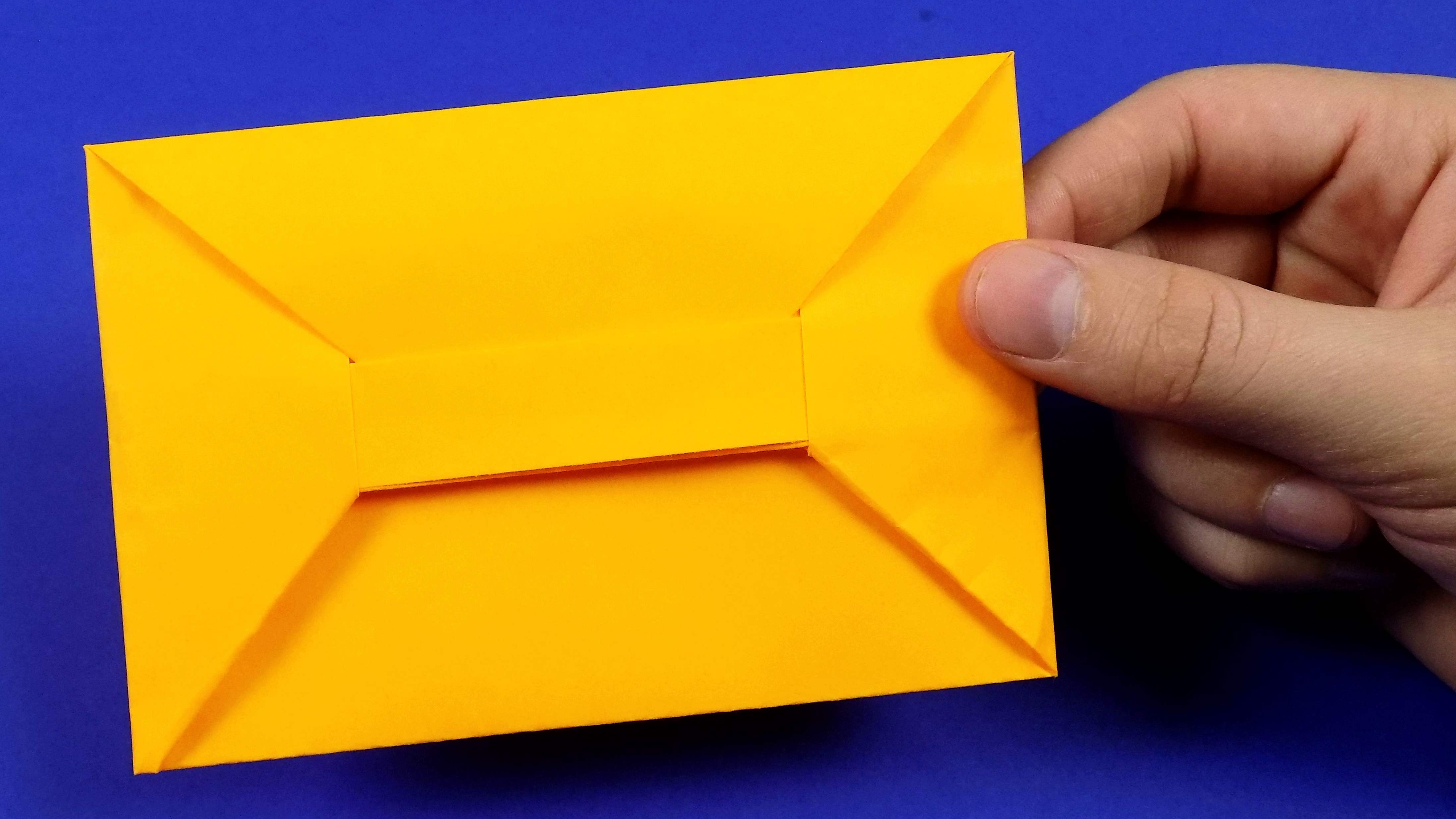 Клеем конверт из бумаги а4. Конверт оригами. Конверт из а4. Конверт из бумаги а4. Оригами конверт из бумаги.