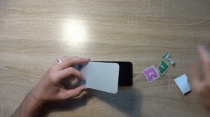 Наклейка гидрогелевой пленки на Mi 11 Ultra.