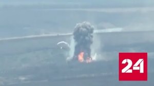 Уничтожение украинского склада с боеприпасами попало на видео - Россия 24