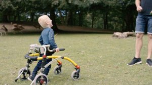 Konrad in the park with his Crocodile walker