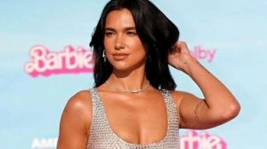 Dua Lipa sets pulses racing in sheer dress at Barbie premiere ?