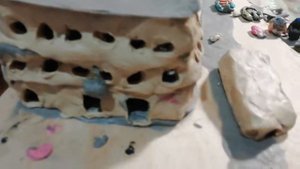 Корабль из пластилина который тонет и стройка в городе из пластилина.