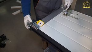 Установка гаражных откатных секционных ворот RYTERNA