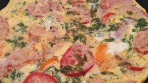 Жареные кабачки с помидорами и яйцом