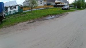 На питбайке по деревне.