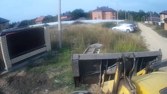 Экскаватор NEW HOLLAND.Планировка под брусчатку