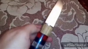 Нож с ручкой из оргстекла и дерева.