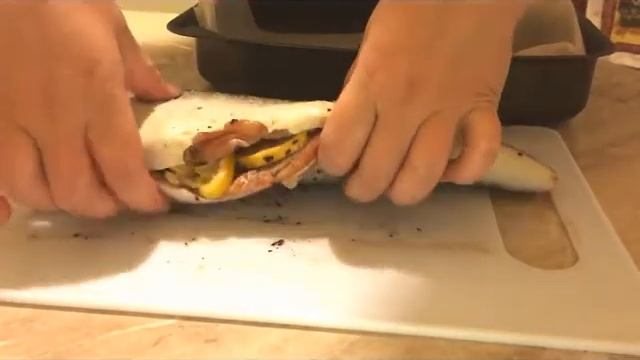 Вкуснейшая рыба запеченная в духовке под майонезным соусом.