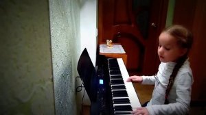 Girl. Piano playing. Девочка играет на пианино.