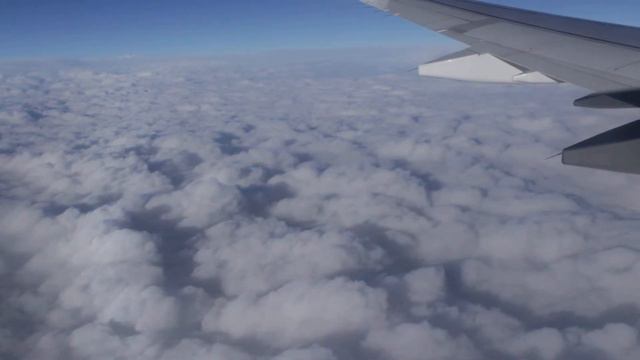 Clouds out an airplane window смотреть онлайн