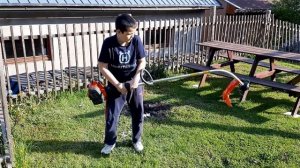 A 10-year-old boy can easily start a Husqvarna 122C trimmer!